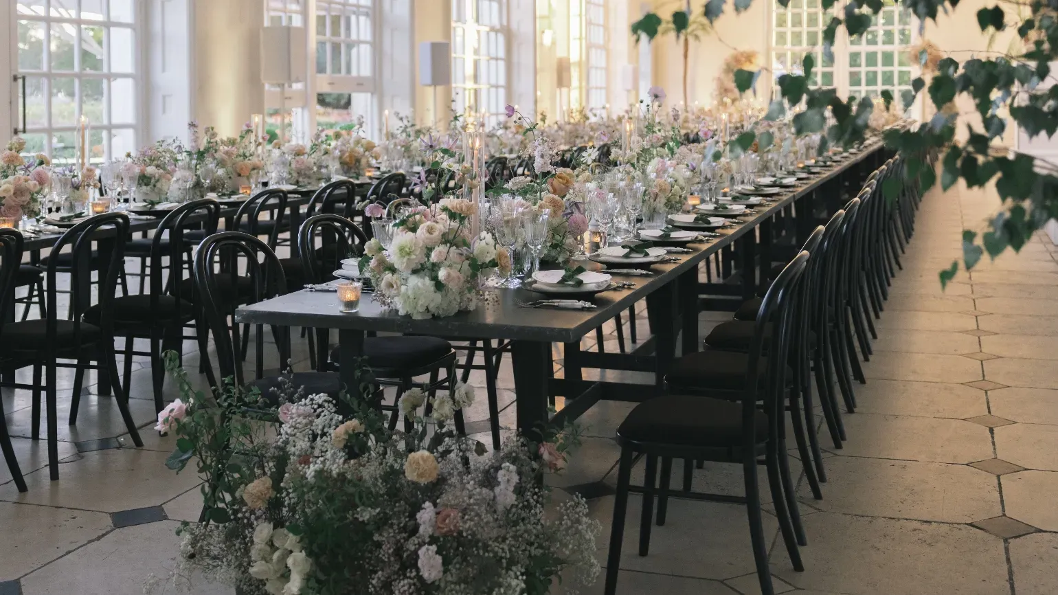 Orangery dining on long tables