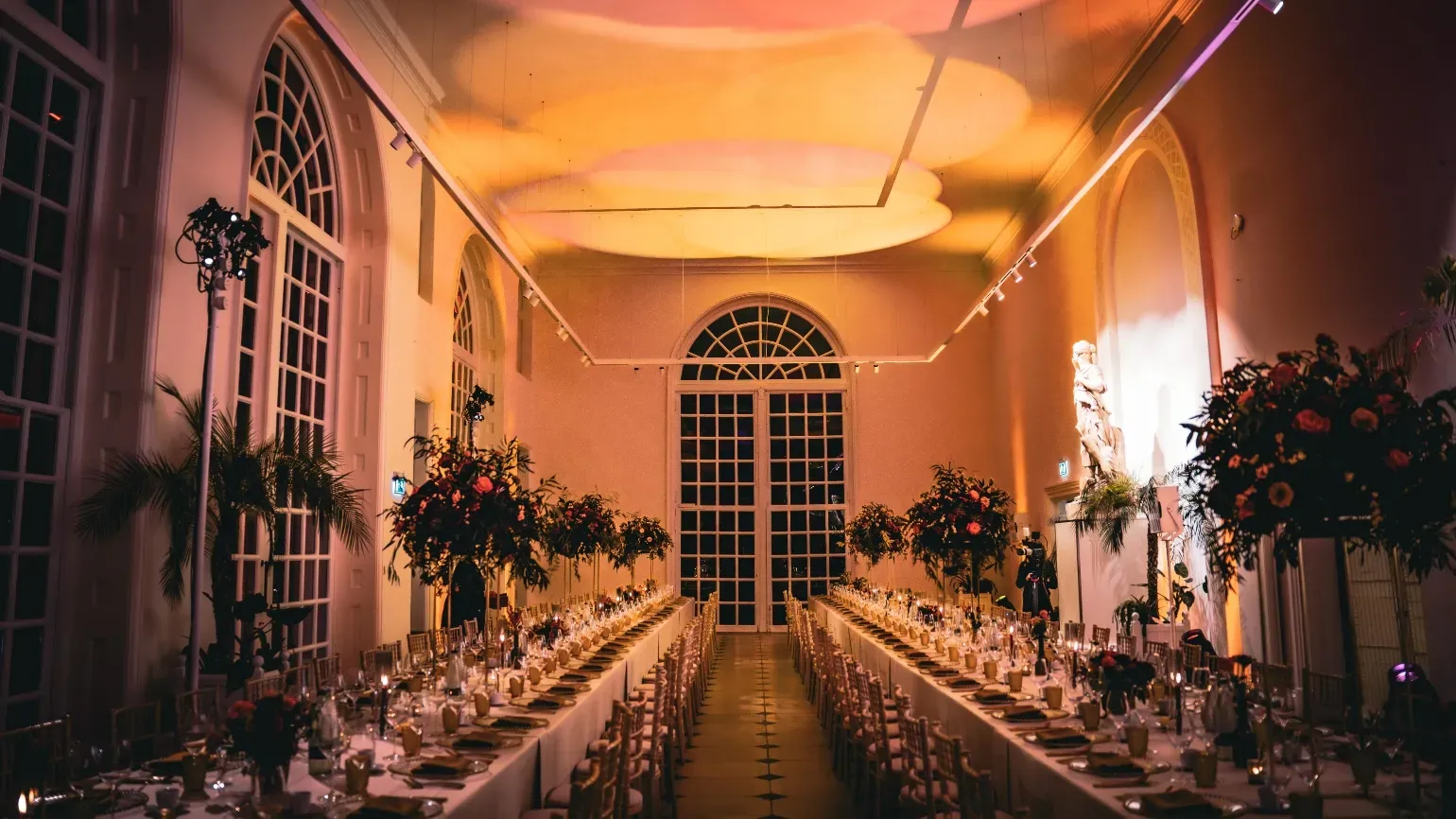 Orangery dining on long tables