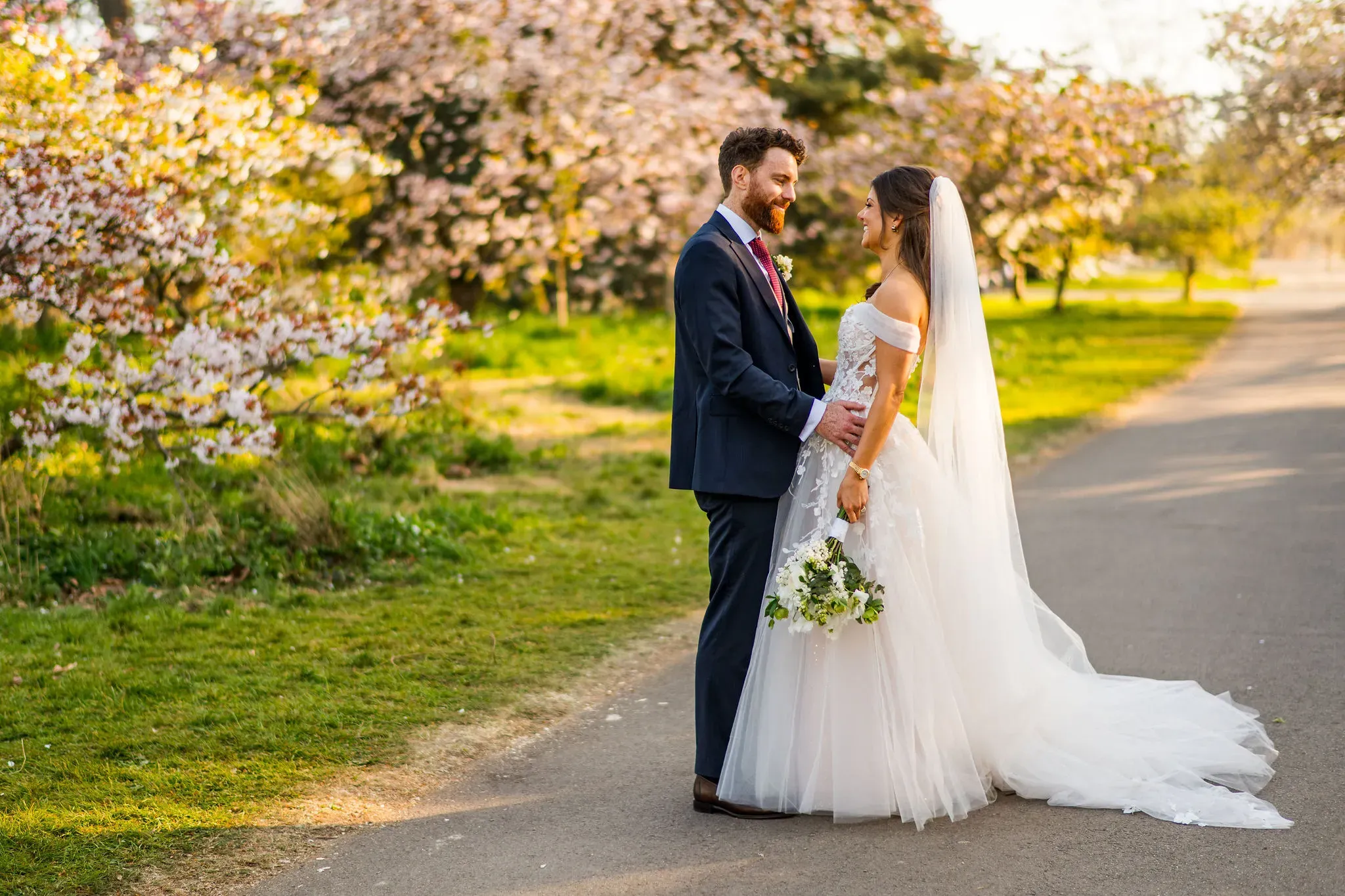 Couple photographs in Spring Blossom
