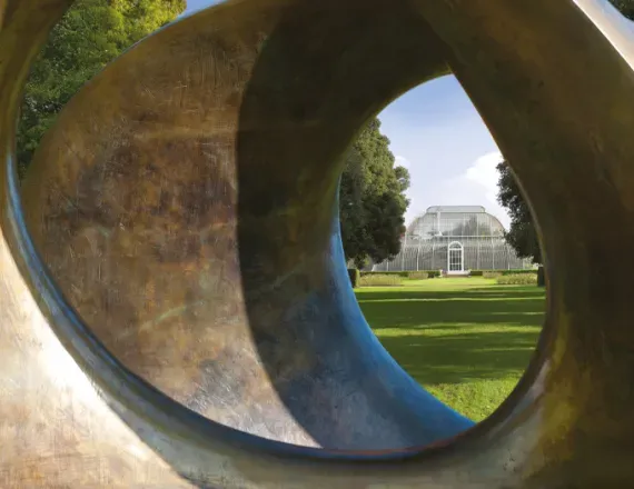 view of the palm house looking through double oval sculpture