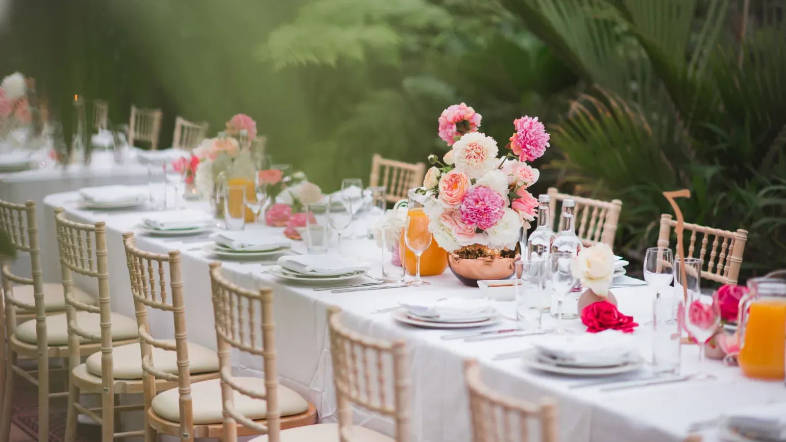 A decorated dinner table in the temperate house