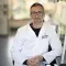 Efisio Mattana in a white lab coat