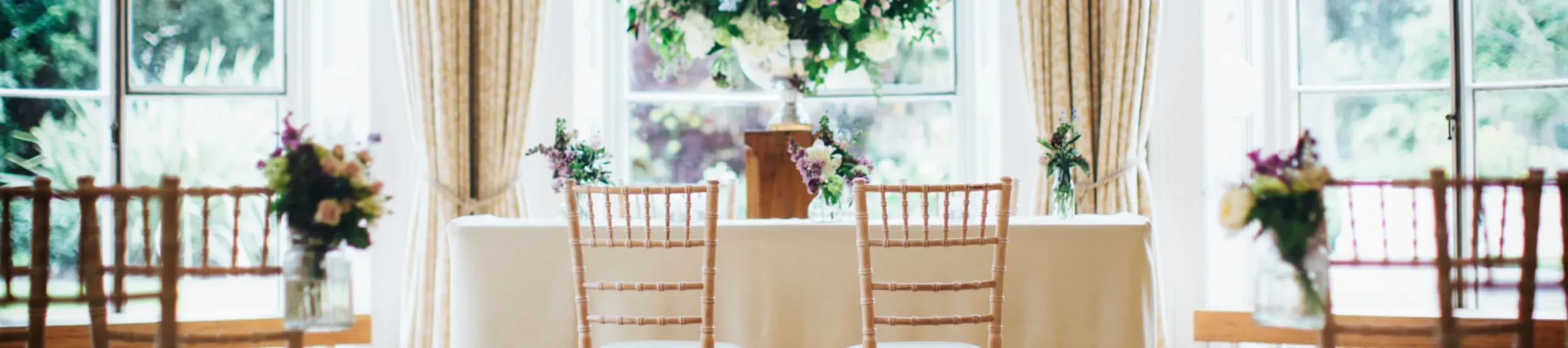 An indoor ceremony at Cambridge Cottage 