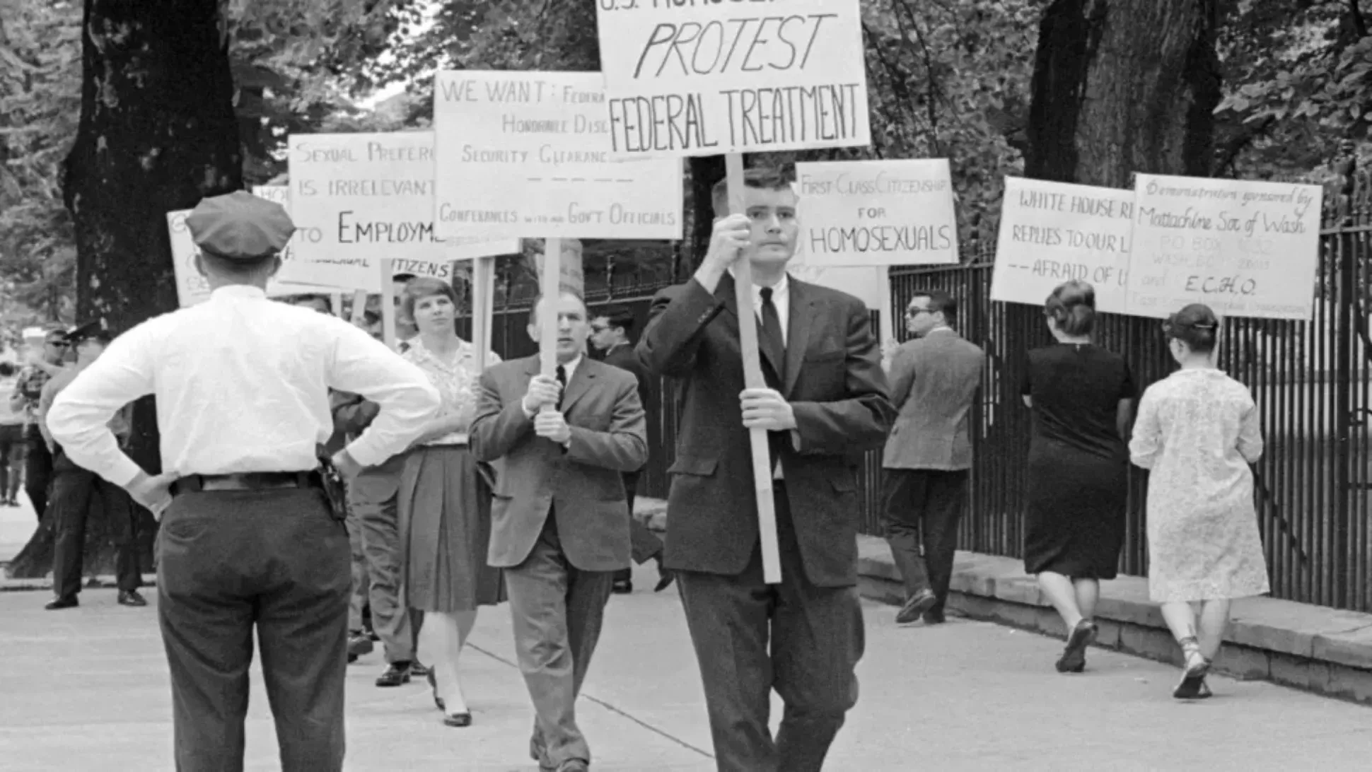 People protesting with placards and signs