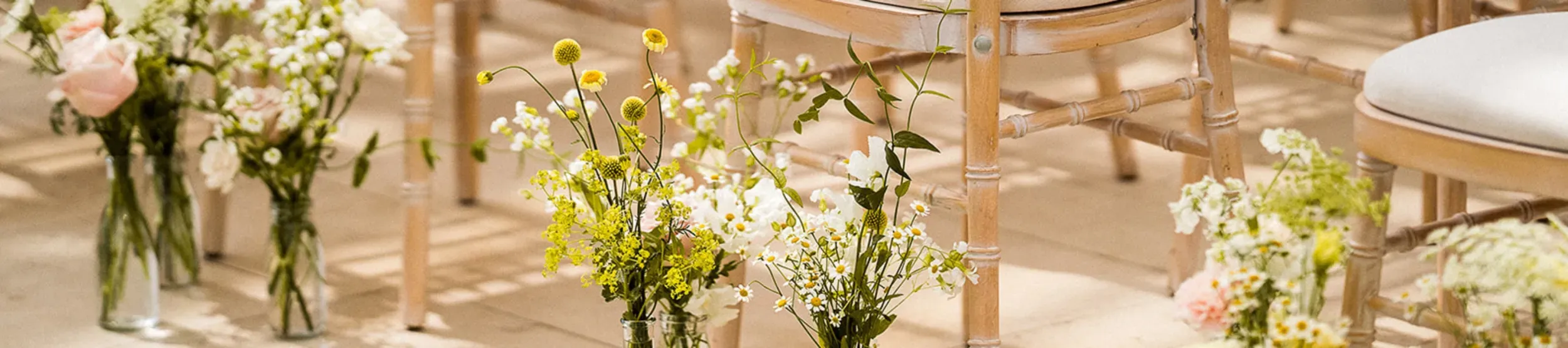 Flowers next to rows of chairs
